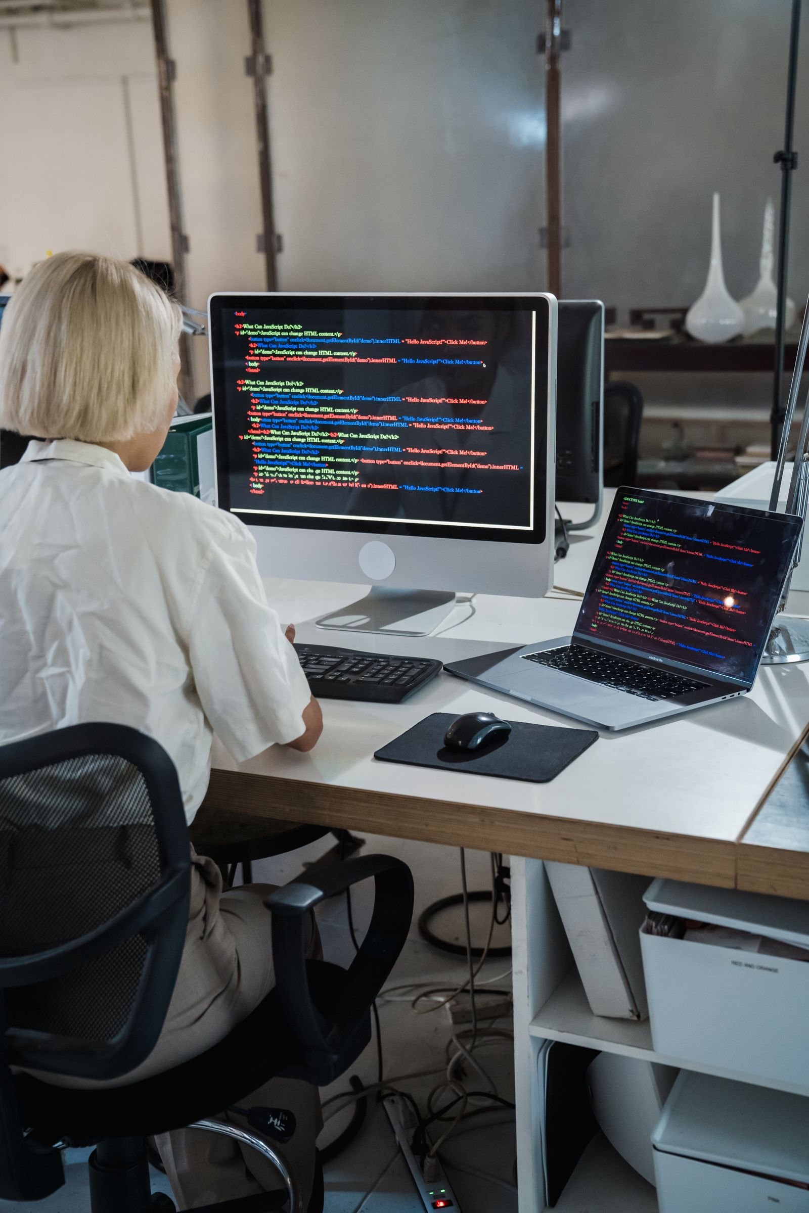 Working across screens of code in a modern IT workspace
